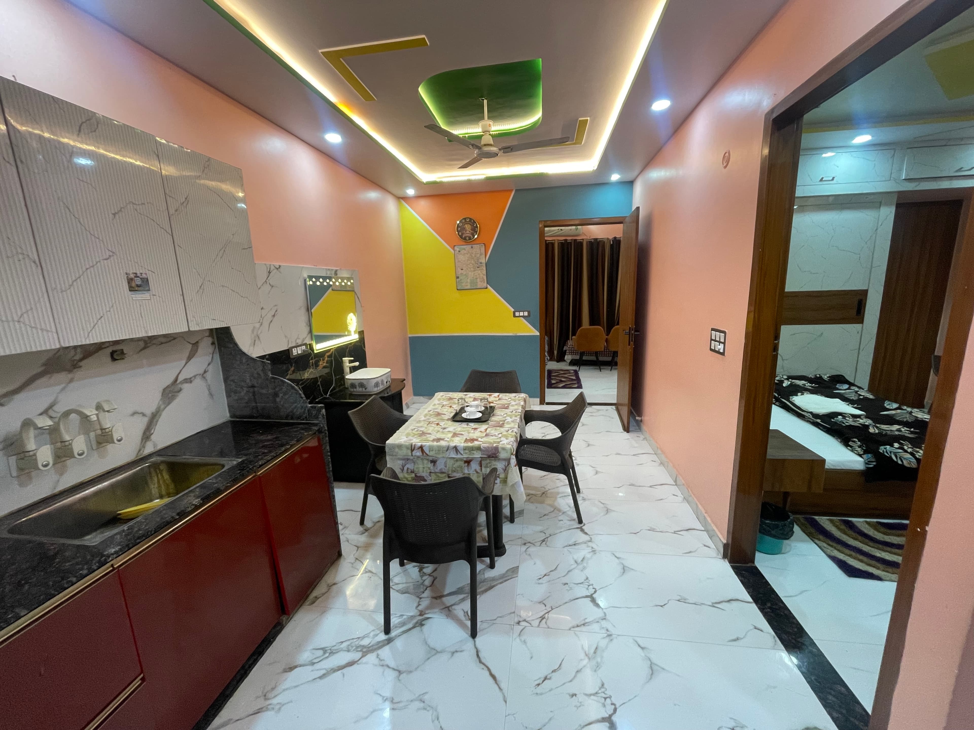 Kitchen counter with sink and dining area view