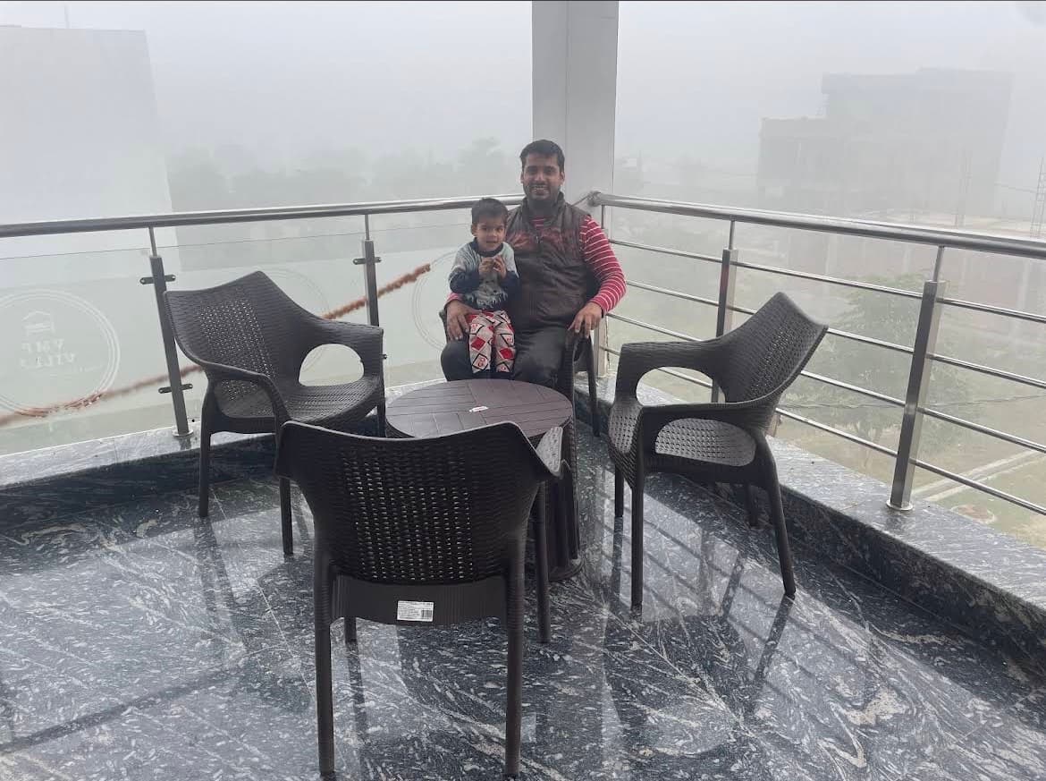 VMP Villa rooftop terrace with chairs and table on a foggy morning